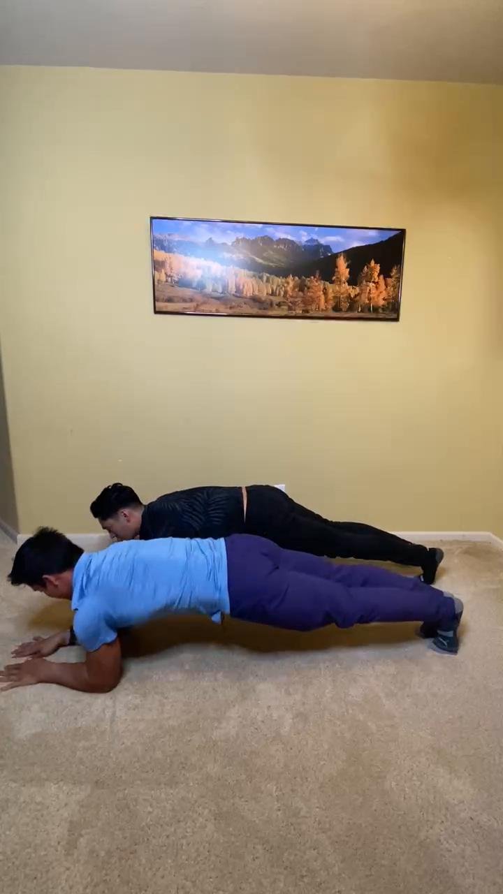 Partner plank twist high fives
