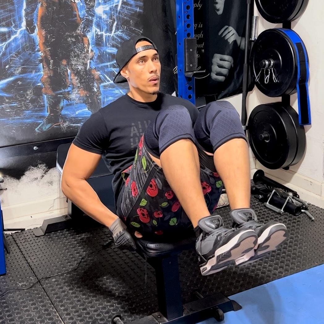 2. Seated knee tucks to leg raises