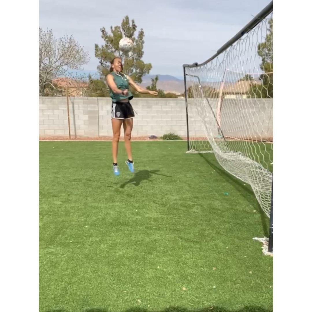 Jumping header to goal